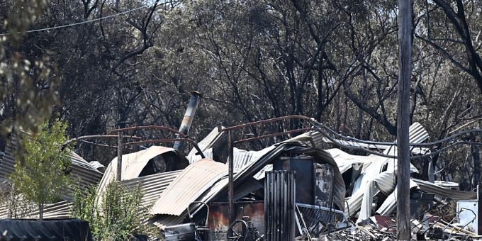 A Property is seen after being destroyed by bushfire near the town of Tara, Queensland, Thursday, October 26, 2023. Sixteen homes have been destroyed and two lives lost due to the bushfires affecting the Darling Downs region.  (AAP Image/Darren England) NO ARCHIVING