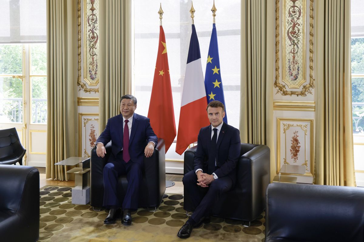 Angespannte Gesichter: Chinas Präsident Xi Jinping zu Besuch bei Frankreichs Staatsoberhaupt Emmanuel Macron.